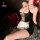 Sexy black mesh maid lingerie set with sheer peekaboo back, white lace apron, and garter straps for adults.