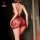Woman wearing red lace seductive sleep dress with open back and floral pattern, playful nightwear for intimate moments.