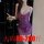 Woman modeling purple lace slip dress with sheer panels, adjustable straps, and cutouts; holds wine glass.