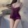 Woman wearing purple lace slip dress with adjustable straps and bow details, sheer step-mom style sleep set with alluring cut...