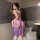 A woman poses in a purple lace sheer sleepwear set featuring a seductive split skirt and strap cami, perfect for small bust w...