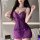 Woman wearing purple sheer lace lingerie sleep dress with bow details, flirty and feminine bedroom outfit.