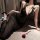 Seductive black sheer lace nightgown with plunging neckline and delicate bows, perfect for intimate moments or elegant sleepw...
