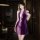 A woman models a purple sensual hanfu lingerie set, featuring a deep v-neckline and floral accents, perfect for sexy qipao sl...