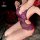 Woman wearing purple sensual lingerie set with open-crotch design, lace detailing, and easy-wear uniform style.