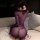Woman wearing purple sheer lace lingerie set with ruched mini dress and drawstring waist, styled as seductive nurse sleepwear...