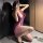 A woman poses with a smartphone, wearing a purple silk-look sensual hanfu lingerie set. the outfit features a push-up bra and...