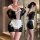Sexy black sheer maid costume with lace apron, revealing thigh-high mesh lingerie featuring peek-a-boo bust and cheeky cutout...
