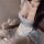 A woman wears a qing lian yi japanese maid costume dress, featuring a sweet and sexy design with lace details. the outfit inc...