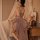 Woman wearing qing lian yi plus size lingerie set with seductive slip dress and flowing robe, posing beside vintage vanity wi...