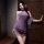A woman poses elegantly in a purple qing ran sensual off-shoulder cheongsam, featuring lace detailing and frog buttons. the d...