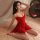 A woman poses elegantly in a red lace sleep dress, featuring delicate straps and a flowing design, perfect for romantic eveni...