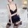 Woman modeling black sheer lace bodysuit with push-up bra and matching thong from qinglianyi sexy lingerie set.