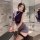 A woman poses confidently wearing a purple bodycon mini skirt paired with a matching sleep dress, highlighting elegant design...