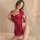 Woman modeling red lace cheongsam dress with sheer sleeves and high slit, bodycon fit for small bust, alluring mini qipao sty...