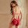 Woman wearing red qingran lace lingerie bodysuit with open-crotch cut-out design, showcasing style uniform outfit for women...
