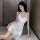 Elegant white satin slip dress with delicate spaghetti straps, perfect for romantic evenings. ideal backless slip dress and m...