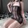 Woman wearing qingran sensual lace bodysuit dress - sheer mesh tight-fit erotic outfit, kneeling on white rug with black-and-...
