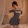 Seductive sheer nightgown with cutout design, paired with uniform-inspired lingerie, offering pure temptation.