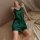 Woman wearing green satin qingran sexy lingerie bodysuit with open-crotch design, student uniform style air hostess outfit.