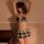 Woman wearing qingran sexy lingerie set with underwire, featuring plaid schoolgirl mini skirt and bra top.