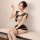 Woman wearing qingran sexy mesh lingerie set with cute student uniform style bodysuit, sitting on a bench and pointing upward...