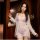 Woman wearing qingran summer sexy cover-up bikini set with butterfly hip tie and lingerie-style top, sheer white robe over la...