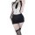 Woman wearing qingruohan milk silk bodysuit secretarial outfit, featuring a white top with black tie and skirt, paired with t...