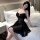 Woman in black qingruohan sensual lingerie set, featuring a seductive no-remove strap nightdress with floral details.