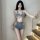 Woman modeling qingruohan sexy lingerie set – denim bra and short panty costume for bedroom play and roleplay.