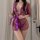 Woman wearing sheer purple lingerie set with lace trim and satin ribbon tie, designed for small bust enhancement.