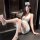 Woman in qingshe nurse-style lingerie set with lace eye mask, posing seductively on bathroom counter — pure yet tempting desi...