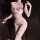 Woman wearing qingshe floral lace nursing bra with sheer push-up cups, matching panties, and lace thigh-highs.