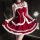 Red christmas dress with white fur trim, featuring a bow and lace details, perfect for festive occasions.