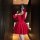 Red velvet dress with lace trim, bodycon fit, strapless design, perfect for festive occasions.