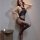 Woman modeling qingyegé sheer bodystocking with this is dream print, featuring transparent panels and sensual design for inti...
