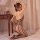 Woman wearing qingyege transparent mesh bodystocking lingerie set, kneeling on bed with hand on head, showcasing sensual desi...