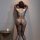 Woman wearing qingyege sexy lace bodysuit with open-crotch design, sheer mesh one-piece lingerie for women, plus size availab...