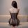 Woman wearing qingyege sheer bodysuit with open-crotch design, showcasing transparent mesh lingerie as sensual sleepwear.
