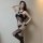 Woman modeling qingyege sheer black lace bodysuit with open-crotch, off-shoulder straps, and matching thigh-high stockings.