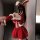Woman in red and white qqny christmas sexy bunny girl dress costume set with bunny ears, taking a mirror selfie.