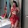Elegant red sheer hanfu attire featuring gold-embossed designs, perfect for -inspired elegance.
