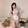 Woman wearing pink qqny japanese-style maid costume with lace trim, white apron, and adjustable straps. cute babydoll dress s...