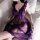 Woman wearing purple qqny plus size lace sleep dress, a sexy sheer bedroom lingerie set with floral lace and bow detail.