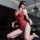 Woman in red lace sleepwear set, kneeling with blindfold, elegant and sensual design, premium soft fabric.