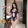 Woman modeling qqny pure allure lingerie set in navy blue with cutout design, elegant and flirty sleepwear for women.