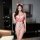 Woman in red and white nurse-themed qqny pure allure sleepwear set, elegant sensual lingerie with lace details and bow accent...