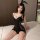 Elegant black bunny-themed sleepwear set featuring sheer mesh design, perfect for luxurious intimate nightwear.