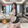 Woman modeling qqny pure allure sleepwear set in a luxurious bedroom setting, showcasing elegant seductive lingerie with lace...