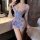 Woman wearing qqny pure allure sleepwear set, elegant sheer lingerie with butterfly print and purple ribbon tie.